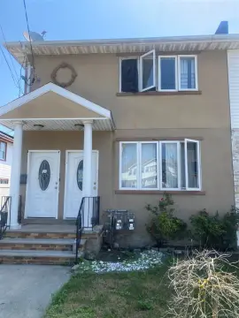 Two-Story Duplex with Driveway