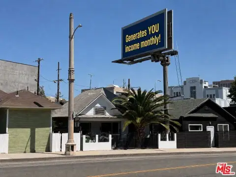Tenant-Occupied Duplex with Billboard