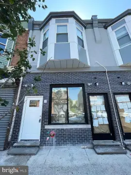 Renovated West Philadelphia Mixed-Use Triplex