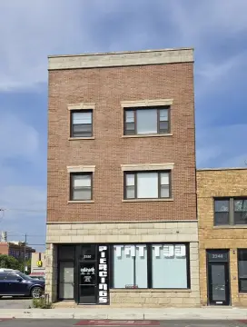 All-Brick 5-Unit Multifamily with Storefront