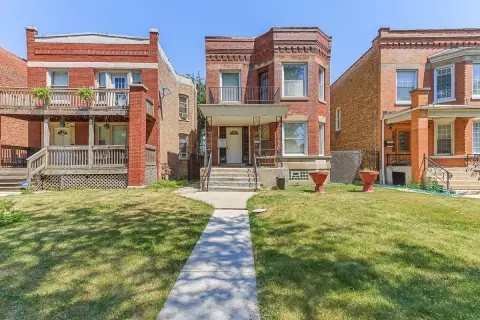 Brick Triplex with Off-Street Parking