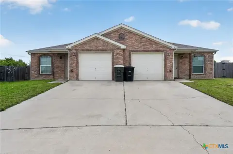 Brick Duplex with Private Garages