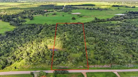 Subdivided Land Tract with Pond Access