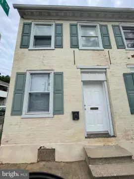 Brick Triplex with Parking Lot