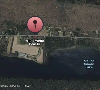 Land with Lake and Mountain Views