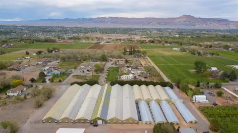 Farm With Commercial Greenhouses