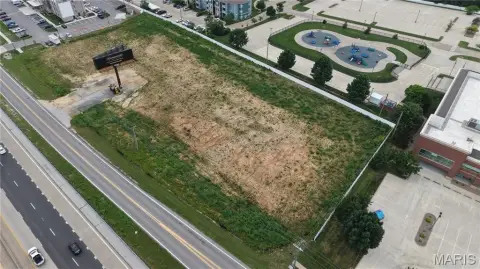 Level Commercial Land With Billboard