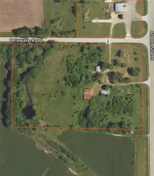 Highway Corner Acreage with Workshop