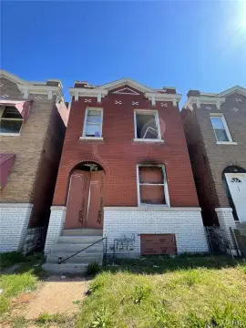 Brick Duplex Requiring Rehabilitation