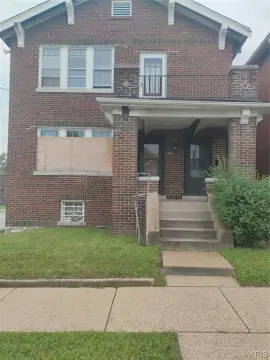 Duplex with Sunrooms and Basement