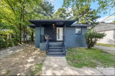 Remodeled Duplex with Modern Finishes