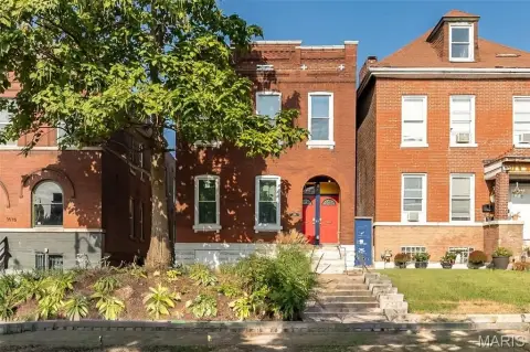Restored Two-Unit Brick Duplex