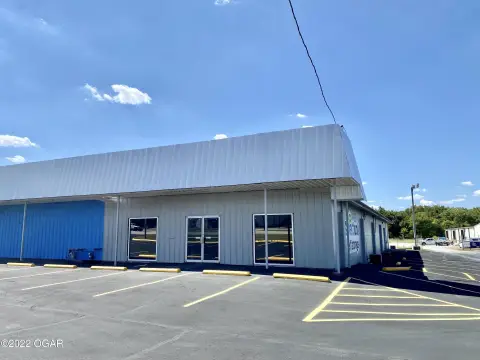 Unfinished Flex Space with Overhead Door