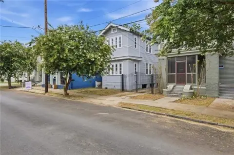 Renovation-Ready Duplex with Bay Front