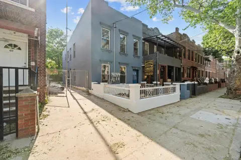 Two-Family Corner Residence with Driveway