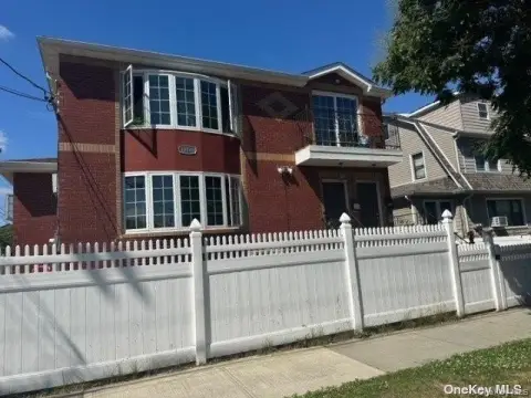 Brick Two-Unit Corner Property
