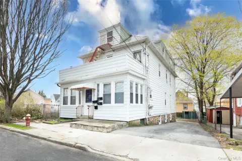 Detached Legal Three-Family Home