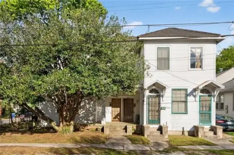 Corner Lot Triplex with Conversion Potential