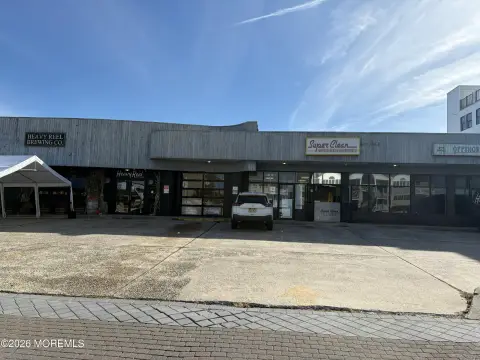 Corner Commercial Land with Retail Building