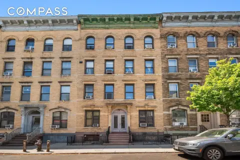 Four-Story Multifamily Building with Yard