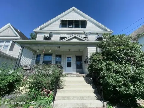 Triplex With Detached Garage