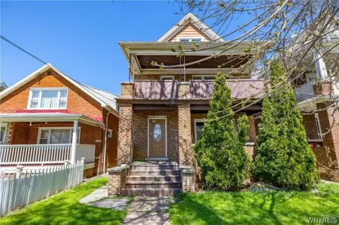 Brick Duplex With Covered Porches