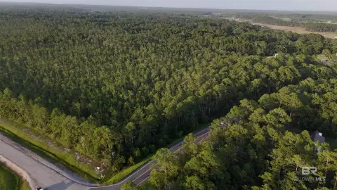Wooded Waterfront Land with Road Frontage