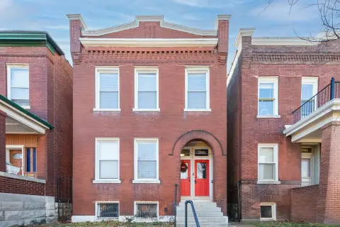 Grove Two-Family Home with Income