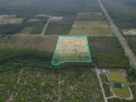 Residential Acreage with Paved Frontage