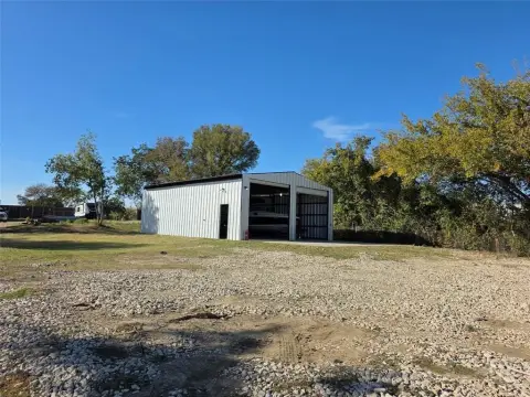 Metal Building with Storage Lot