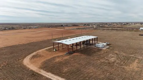 Andrews Land with Steel Building