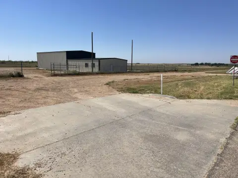 Storage Warehouse with Drive-In Parking Barn