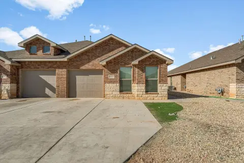 Brick Duplex with Garages