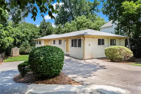Updated Quadplex with In-Unit Laundry