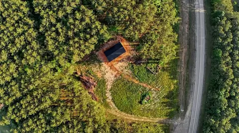 Cleared Acreage with Shop Building