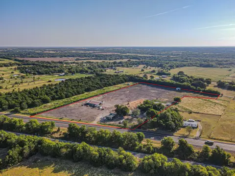 Fenced Agricultural Land with Barns