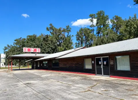 Commercial Land with Existing Buildings