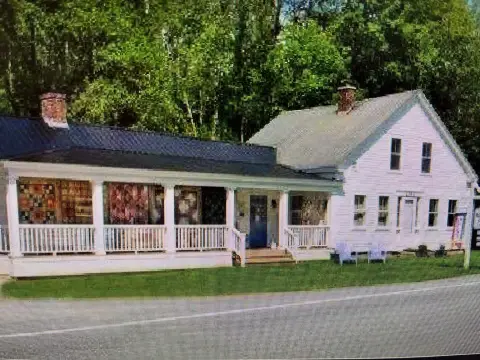 Storefront Property with Waterwheel Barn