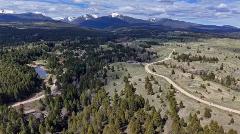 Land with Mountain and Creek Views