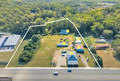 Commercial Land with Existing Structures