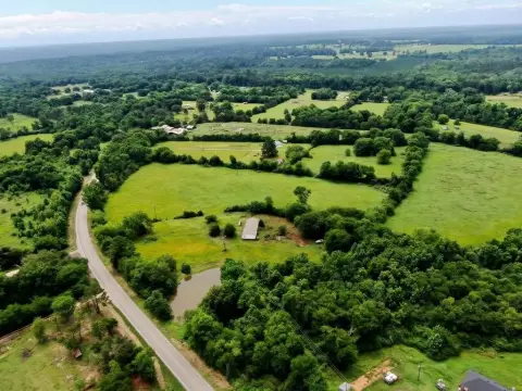 Unrestricted Land with Pond and Fencing
