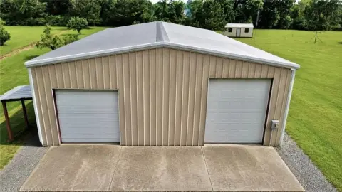 Insulated Red Iron Shop with RV Hookups