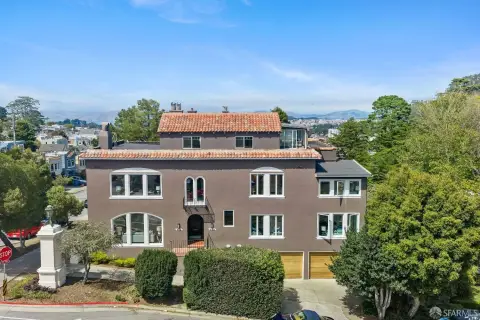Spanish-Style Duplex with Four-Car Garage