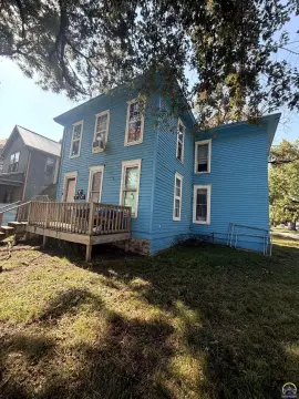 Occupied Triplex With Off-Street Parking