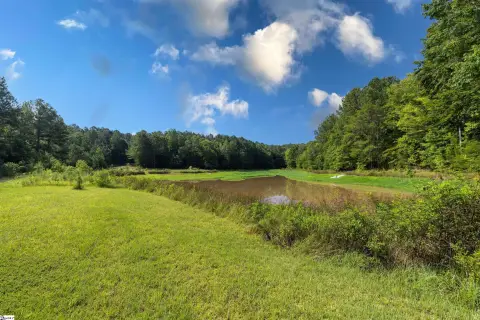 Woodruff Acreage with Pond and Creek