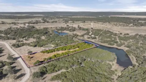 Land with Lake and Mountain Views