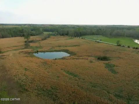 Hollow Rock Acreage with Pond