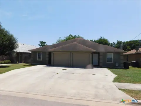 Two-Unit Duplex with Attached Garages