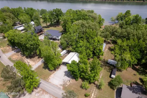 Riverfront Land with Covered Building