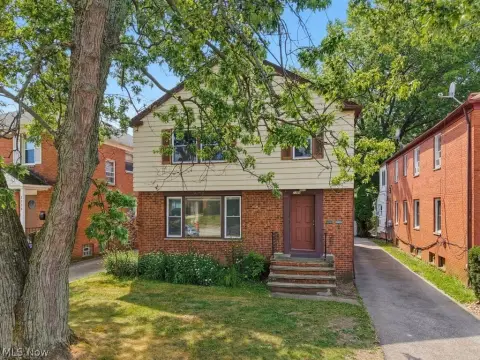 Two-Family Home with Enclosed Porches